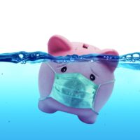 Piggy bank Wearing A Protective Face Mask Drowning In Underwater - Protection Concept And Savings To Risk